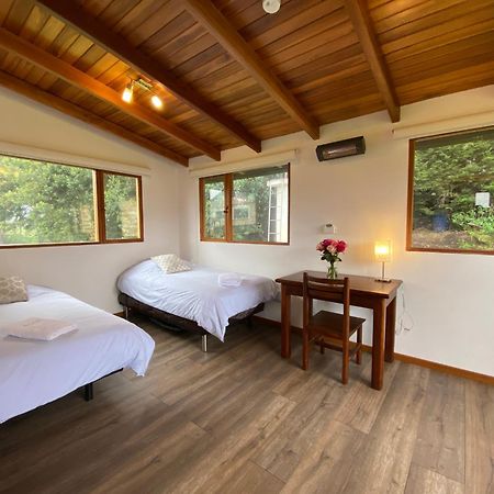 Hosteria Papagayo Cotopaxi Machachi Habitación foto