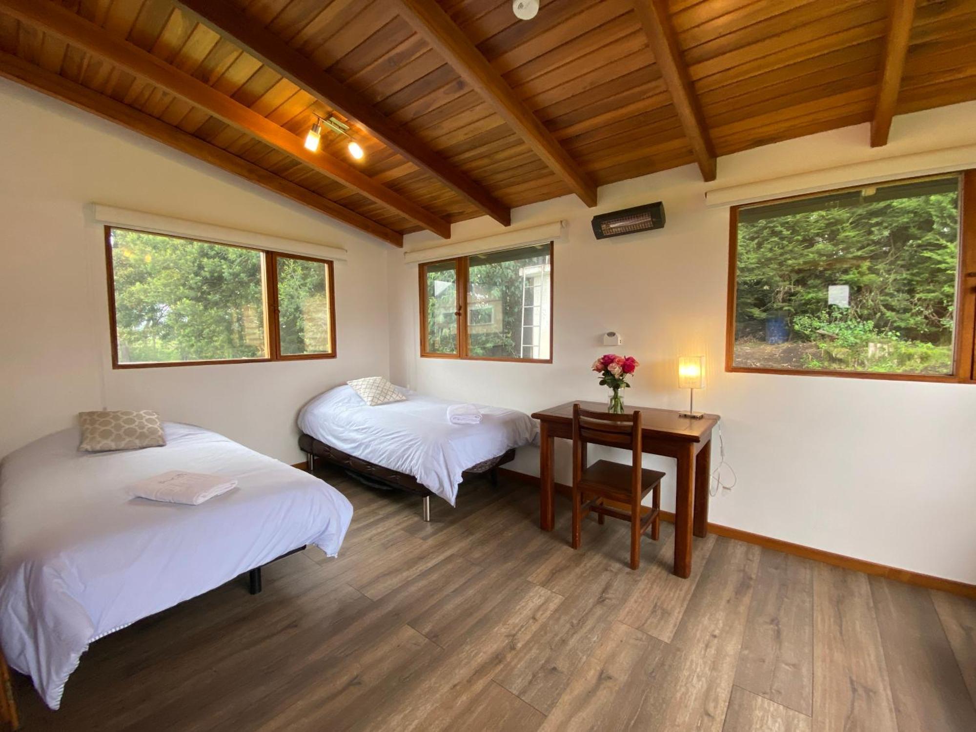 Hosteria Papagayo Cotopaxi Machachi Habitación foto